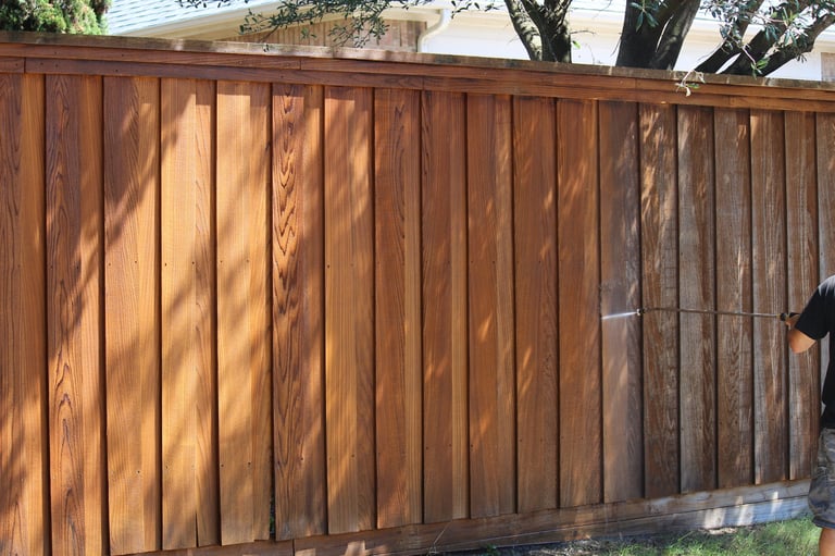 Power washing the fence prior to re-staining, high pressure cleaning, pressure washing fence